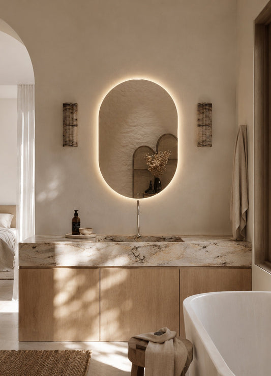 Elena LED Wall Mirror - 900 x 600 in Frameless LED, styled in a room