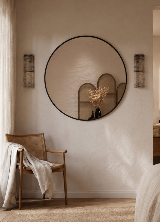 Jasmine Framed Wall Mirror - 800 in Matte Black, styled in a room