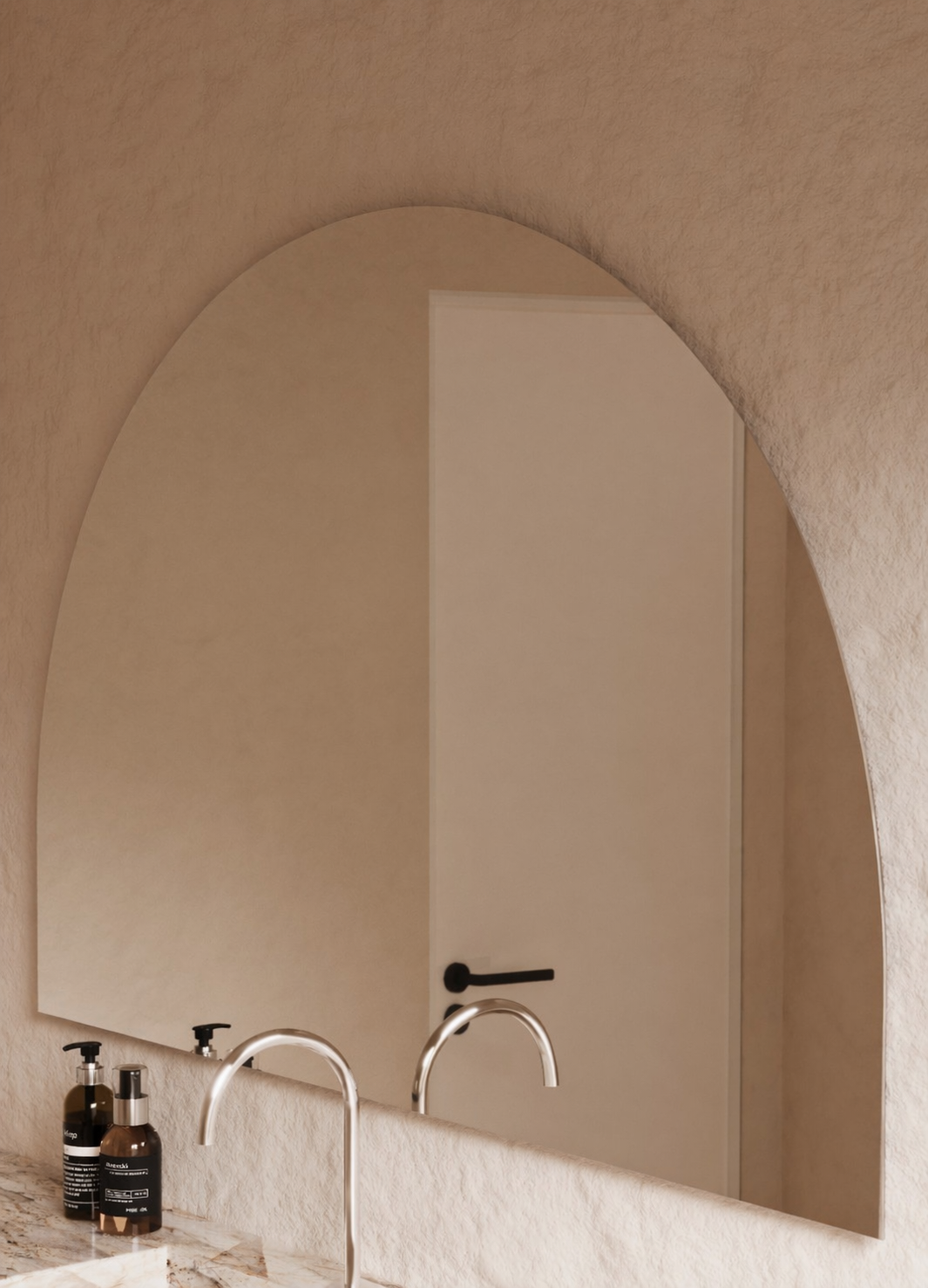 Danielle frameless D-shape mirror polished edge detail, close up