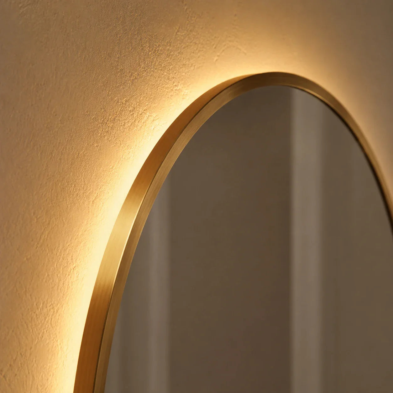 Sienna Copper LED Arch Mirror close-up of the Antique Copper frame edge and LED glow