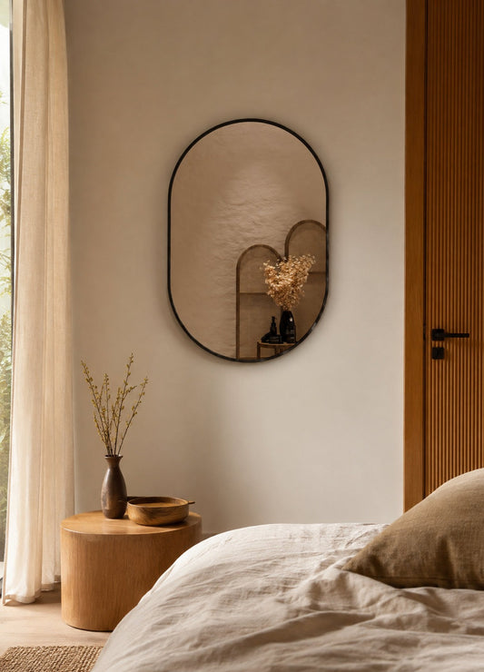 Elena Framed Wall Mirror - 900 x 600 in Matte Black, styled in a room