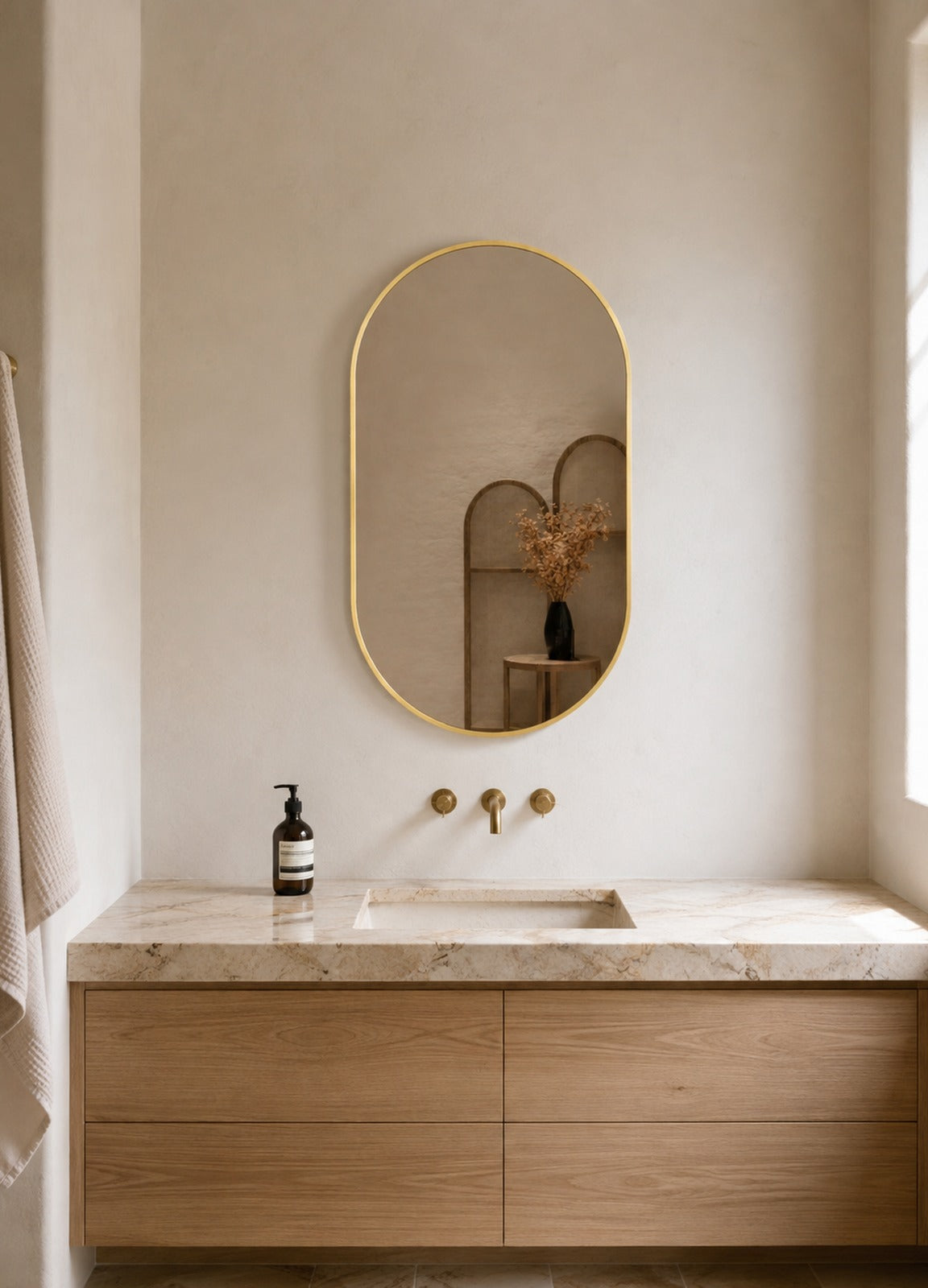 Elena Framed Wall Mirror - 900 x 600 in Brushed Gold, styled in a room
