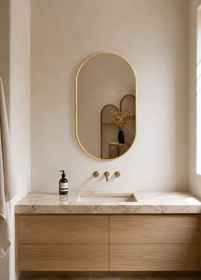 Elena Framed Wall Mirror - 900 x 600 in Brushed Gold, styled in a room