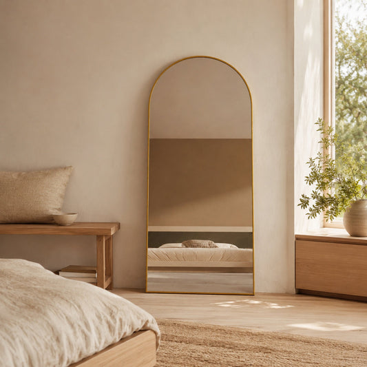 Sienna Framed Arch Mirror - 1800 x 850 in Antique Copper, styled in a room