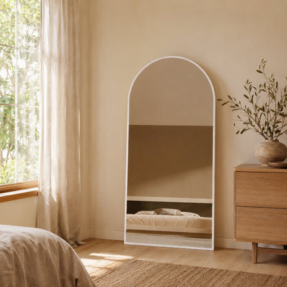 Sienna Framed Arch Mirror - 1800 x 850 in White Satin, styled in a room