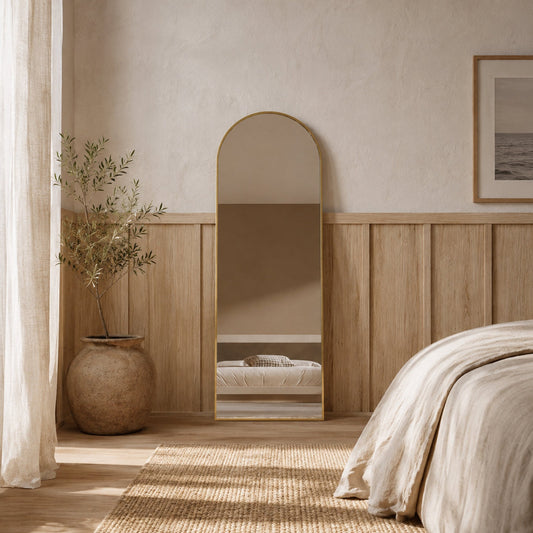 Sienna Framed Arch Mirror - 1700 x 610 in Antique Copper, styled in a room