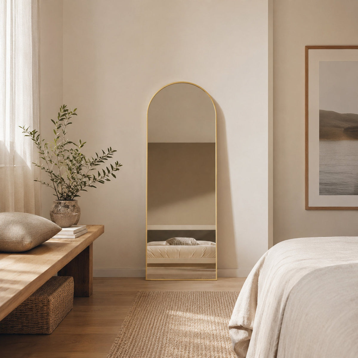 Sienna Framed Arch Mirror - 1700 x 610 in Brushed Gold, styled in a room