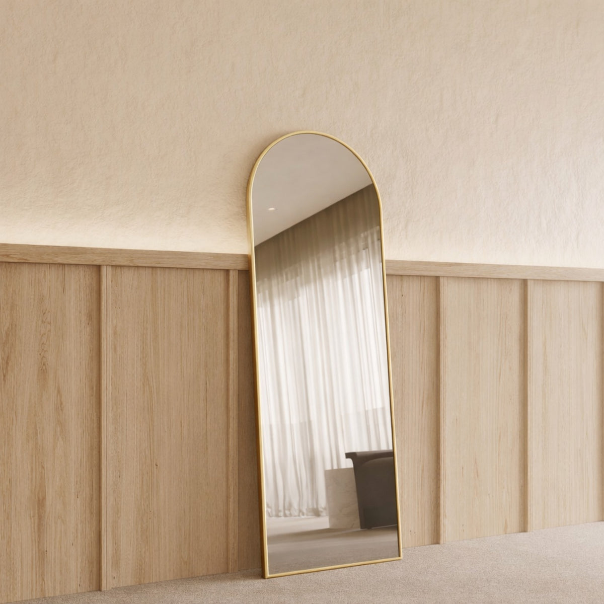 Sienna Framed Arch Mirror - 1700 x 610 in Brushed Gold, angled from the left