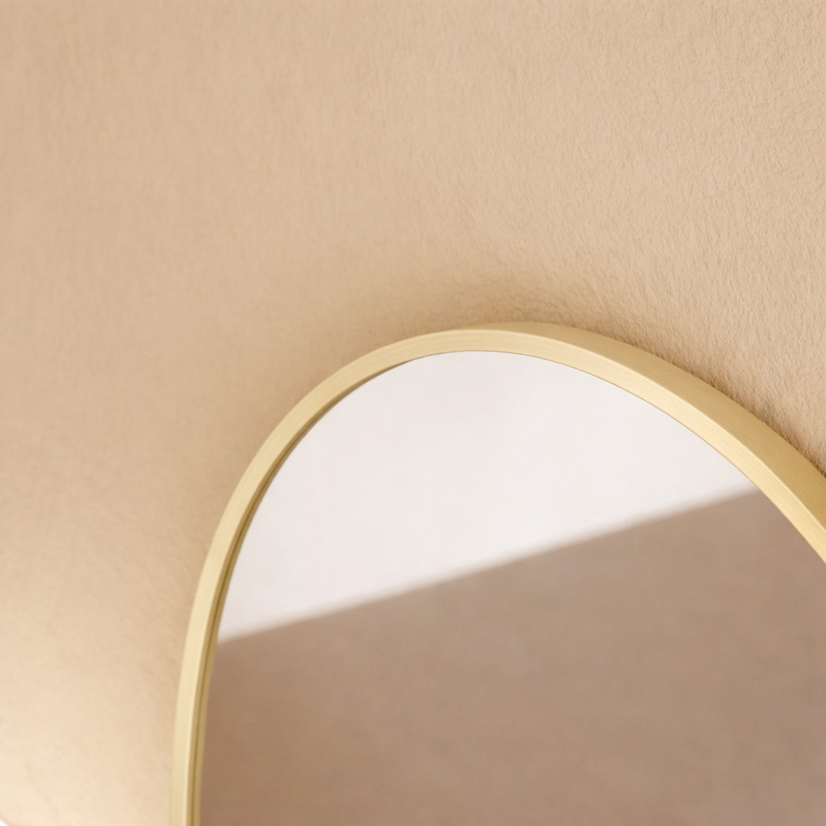 Sienna Framed Arch Mirror - 1700 x 610 in Brushed Gold, edge and finish detail, close up