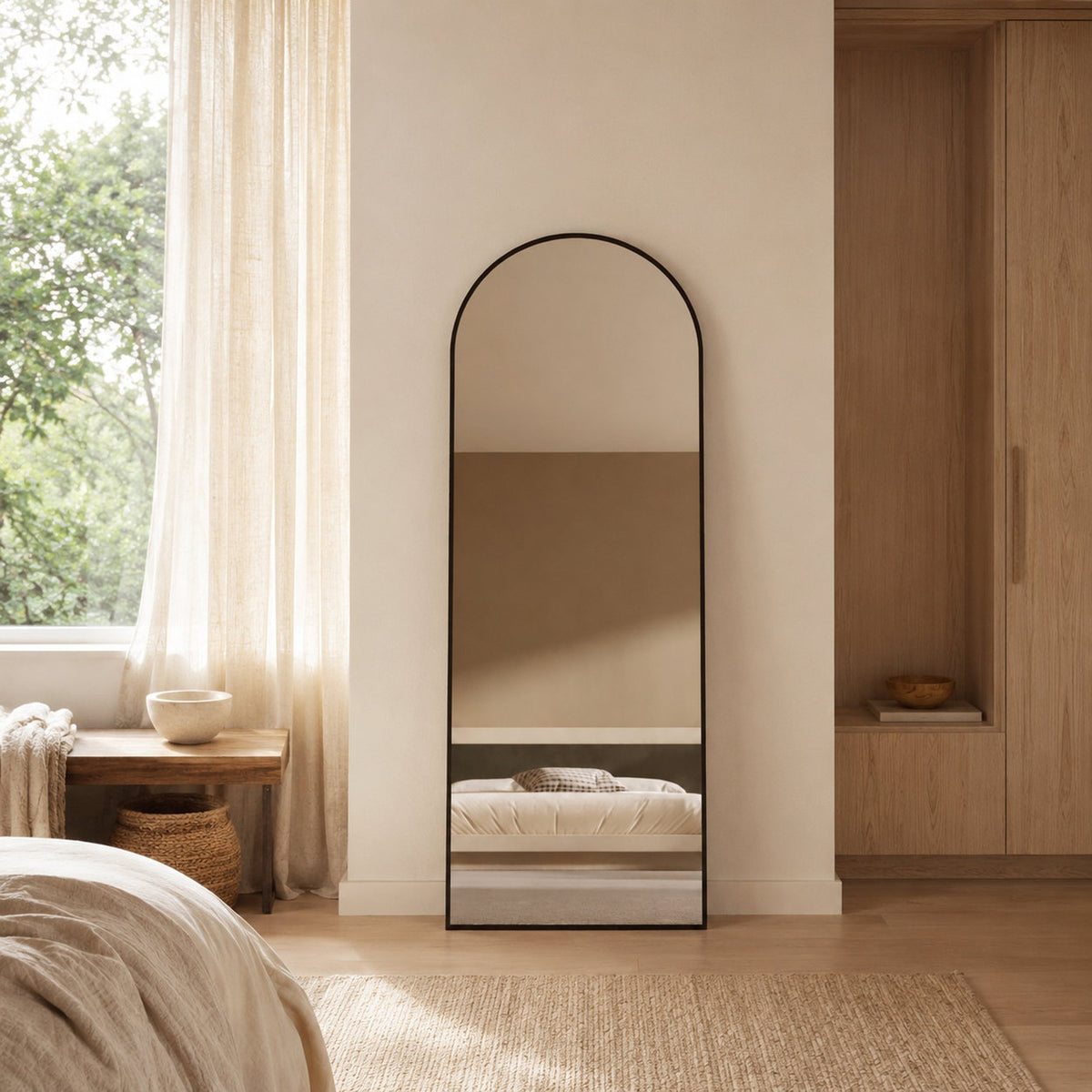 Sienna Framed Arch Mirror - 1700 x 610 in Matte Black, styled in a room