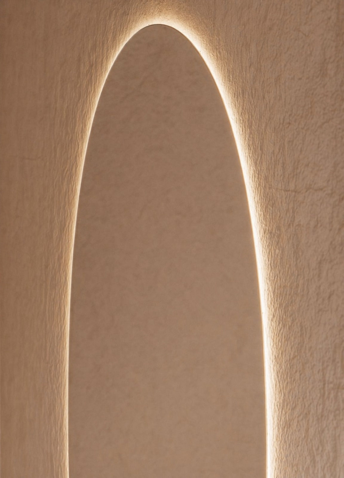 Vittoria LED Wall Mirror - 1100 x 900 in Frameless LED, angled from the right