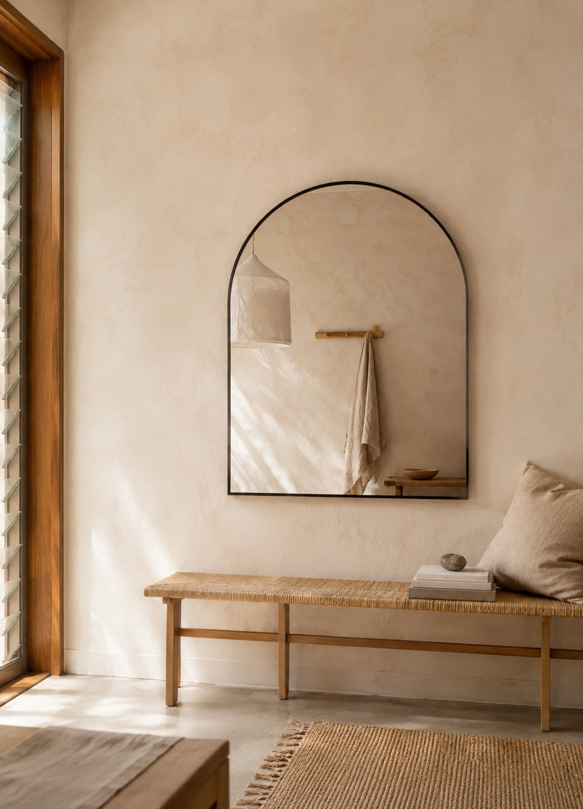 Vittoria Framed Wall Mirror - 1100 x 900 in Matte Black, styled in a room
