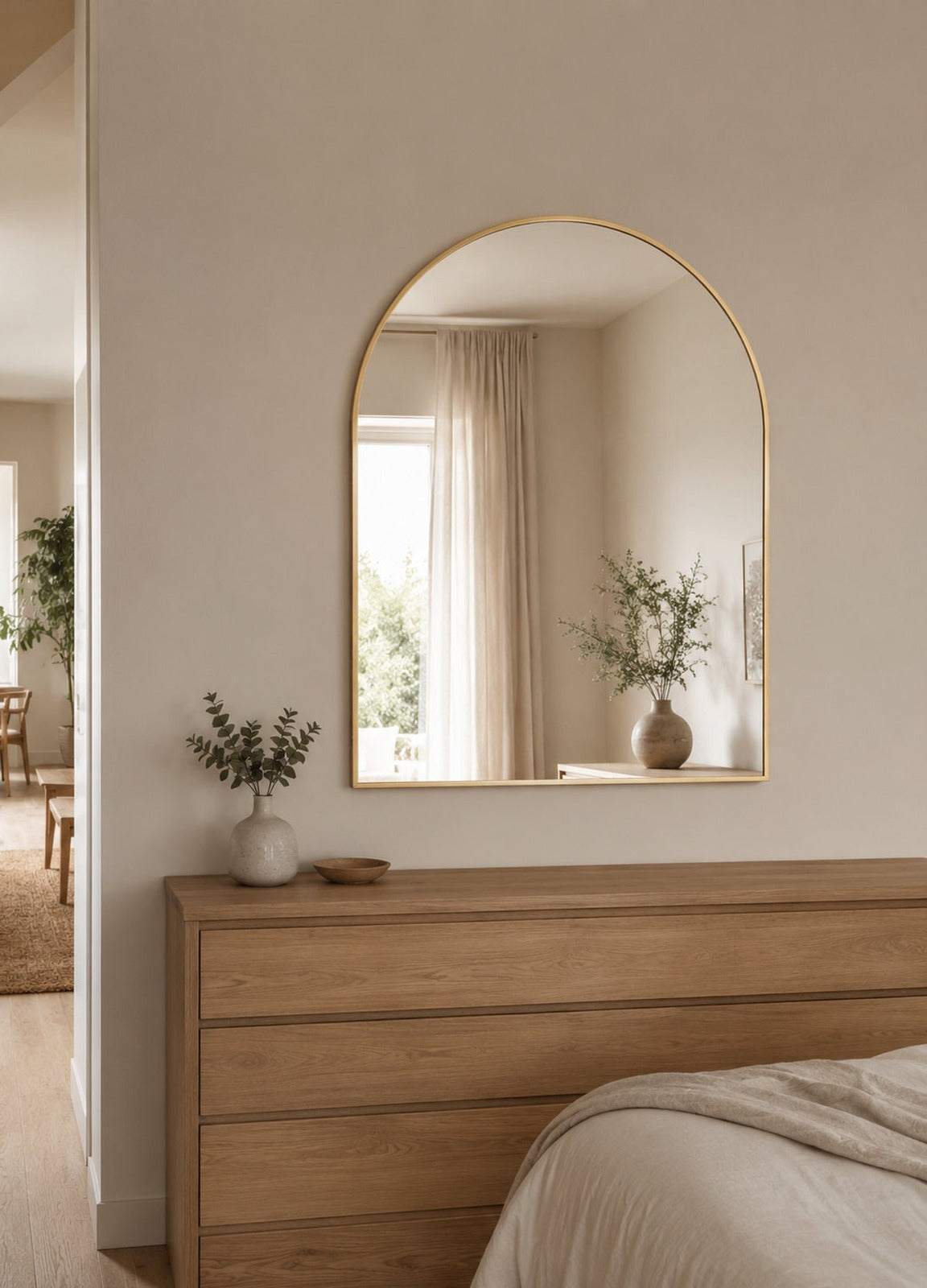 Vittoria Framed Wall Mirror - 1100 x 900 in Brushed Gold, styled in a room