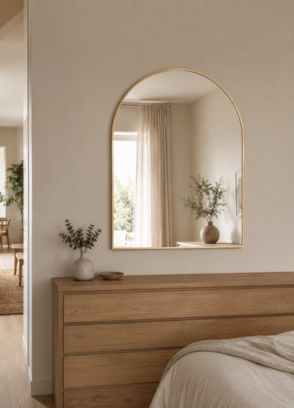 Vittoria Framed Wall Mirror - 1100 x 900 in Brushed Gold, styled in a room
