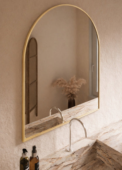 Vittoria Framed Wall Mirror - 1100 x 900 in Brushed Gold, angled from the left